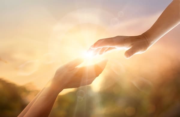 A Conceptual Image of God's Hands Reaching Out in Relationship