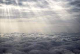 Sunlight Filtering Through Clouds Is a Concept Photo to Portray Activating Your Spiritual Gifts